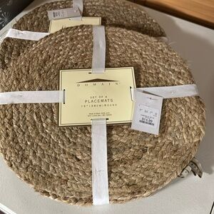 Set of eight placemats 15 inches round. Brand new.